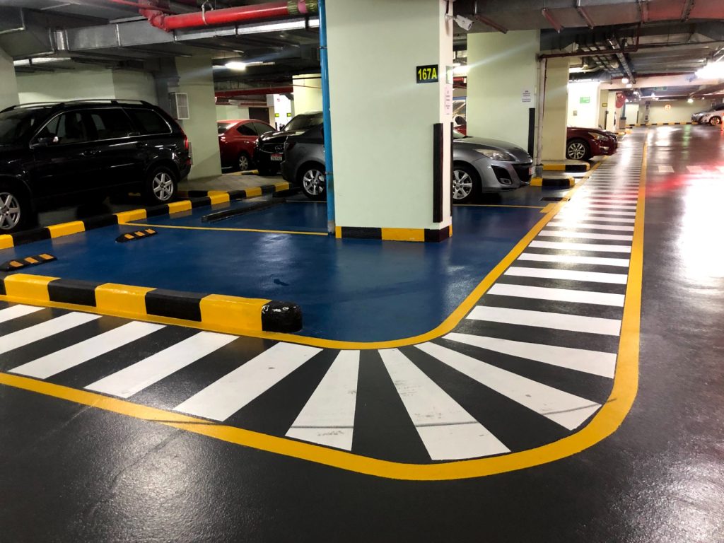 Seamless resin coating on a concrete surface
